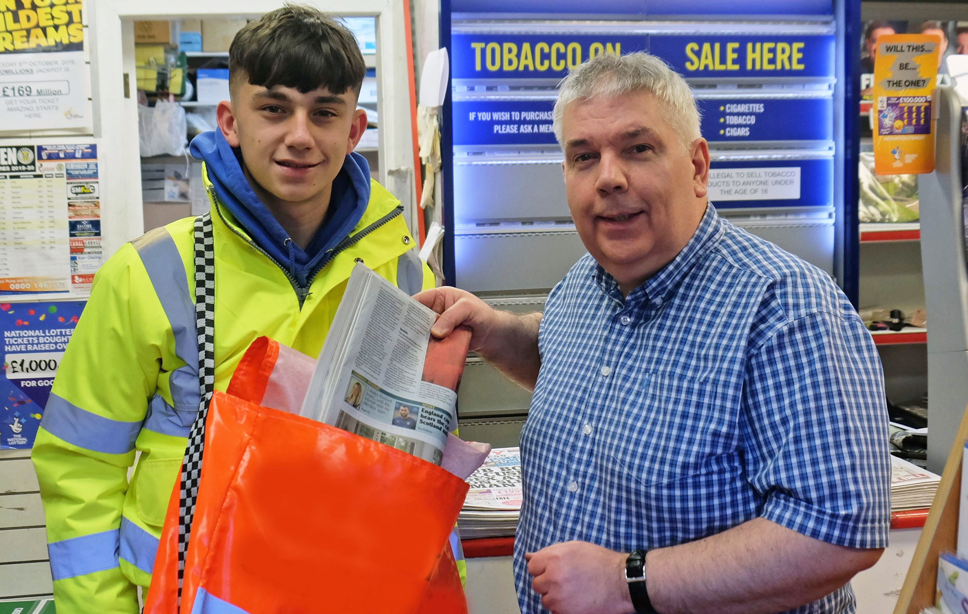 Liam Scobie with Des Barr from Sinclair Barr newsagents