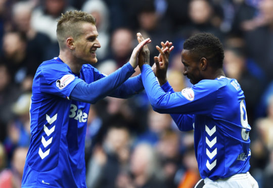 Jermain Defoe celebrates with Steven Davis