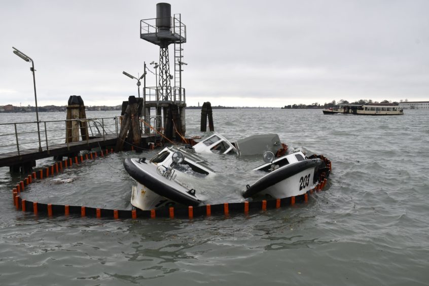 Partially submerged ferry boats