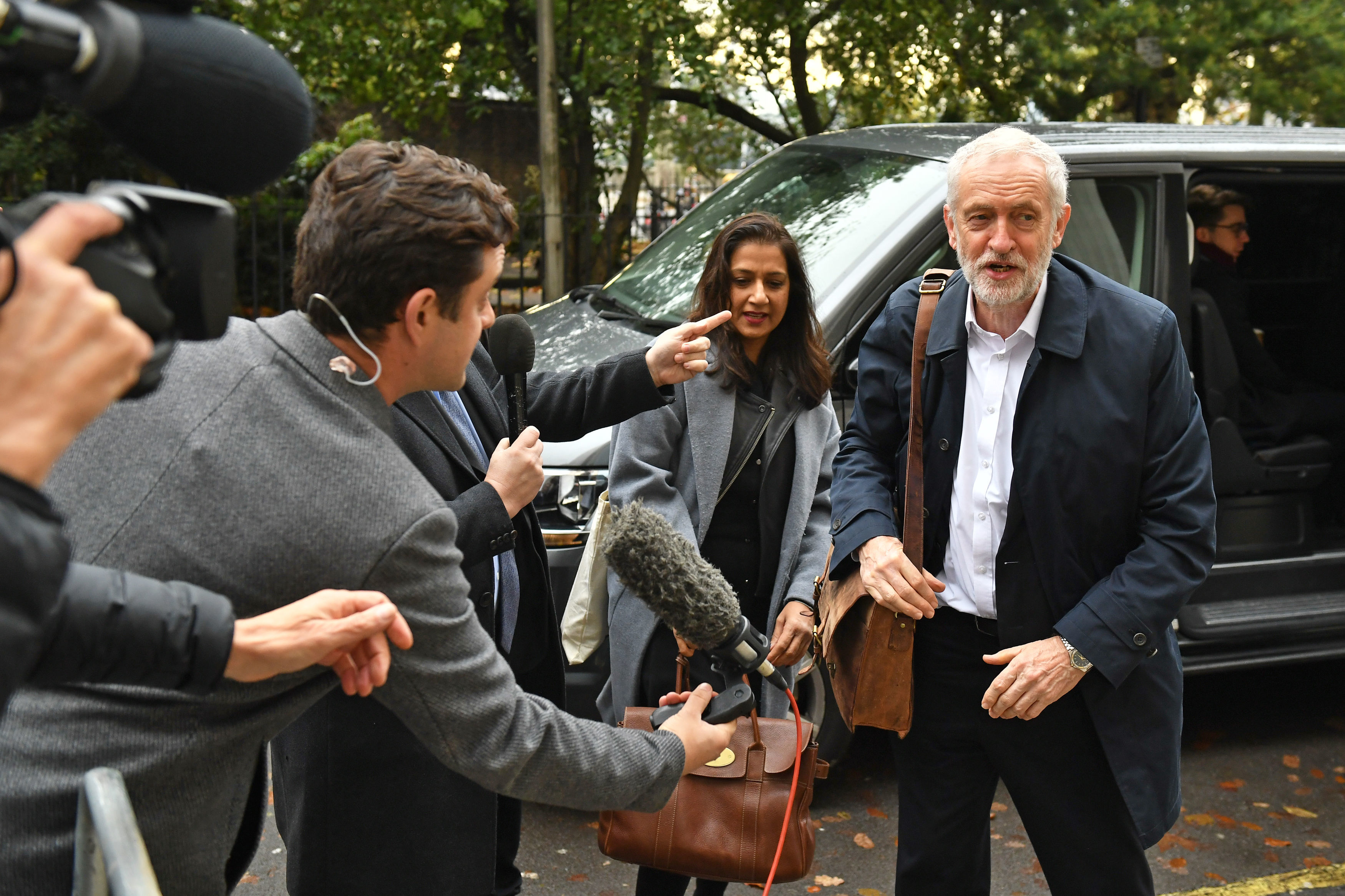 Labour Party leader Jeremy Corbyn arrives for a Labour clause V meeting on the manifesto at Savoy .