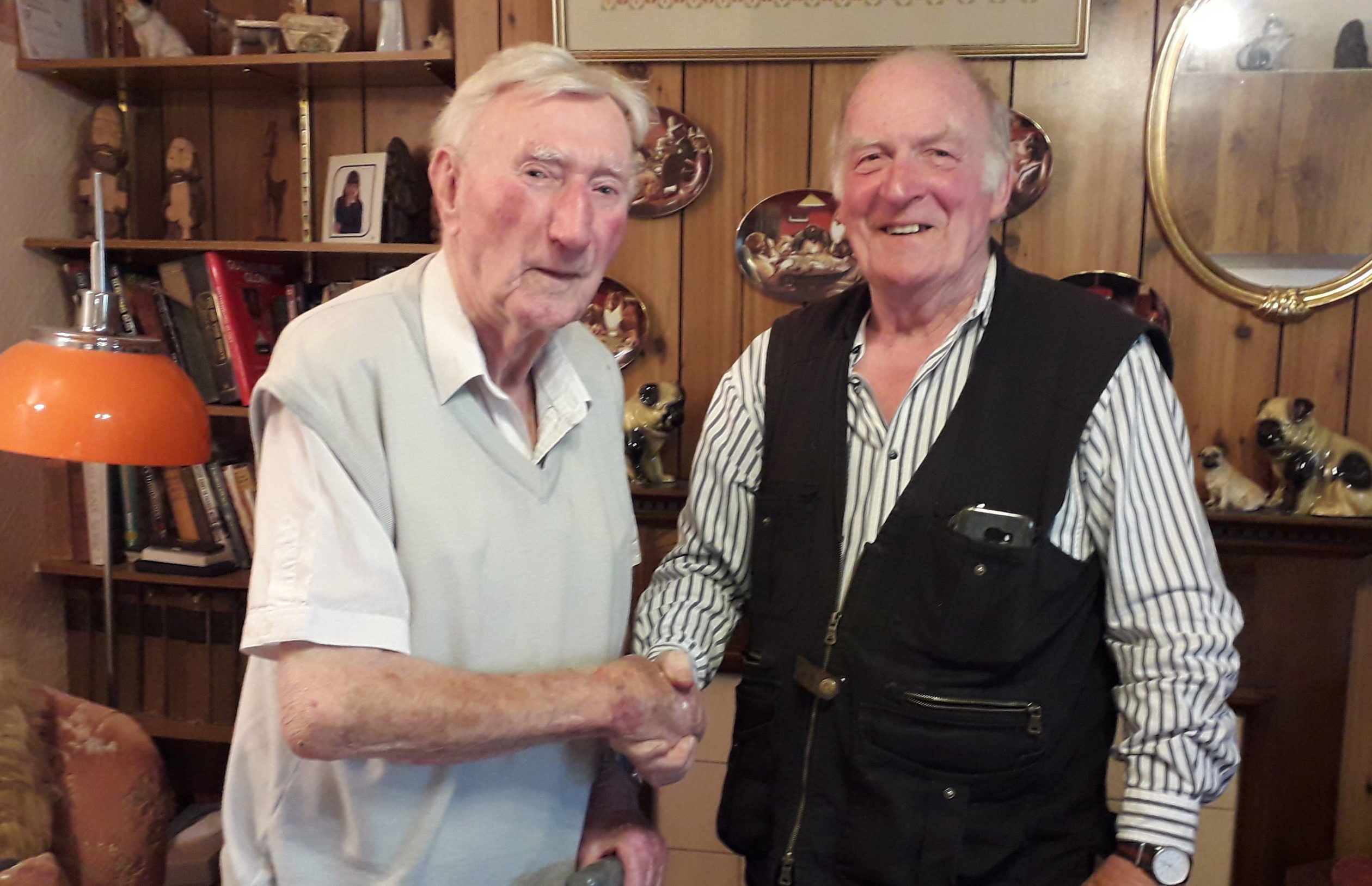 Jimmy Johnstone (left), 98, meeting with Sandy Petrie (right) the son of his former comrade, Bert Petrie