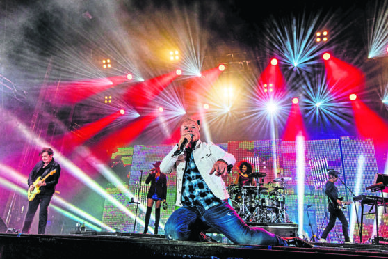 Frontman, Jim Kerr and Simple Minds play Slessor Gardens, Dundee.