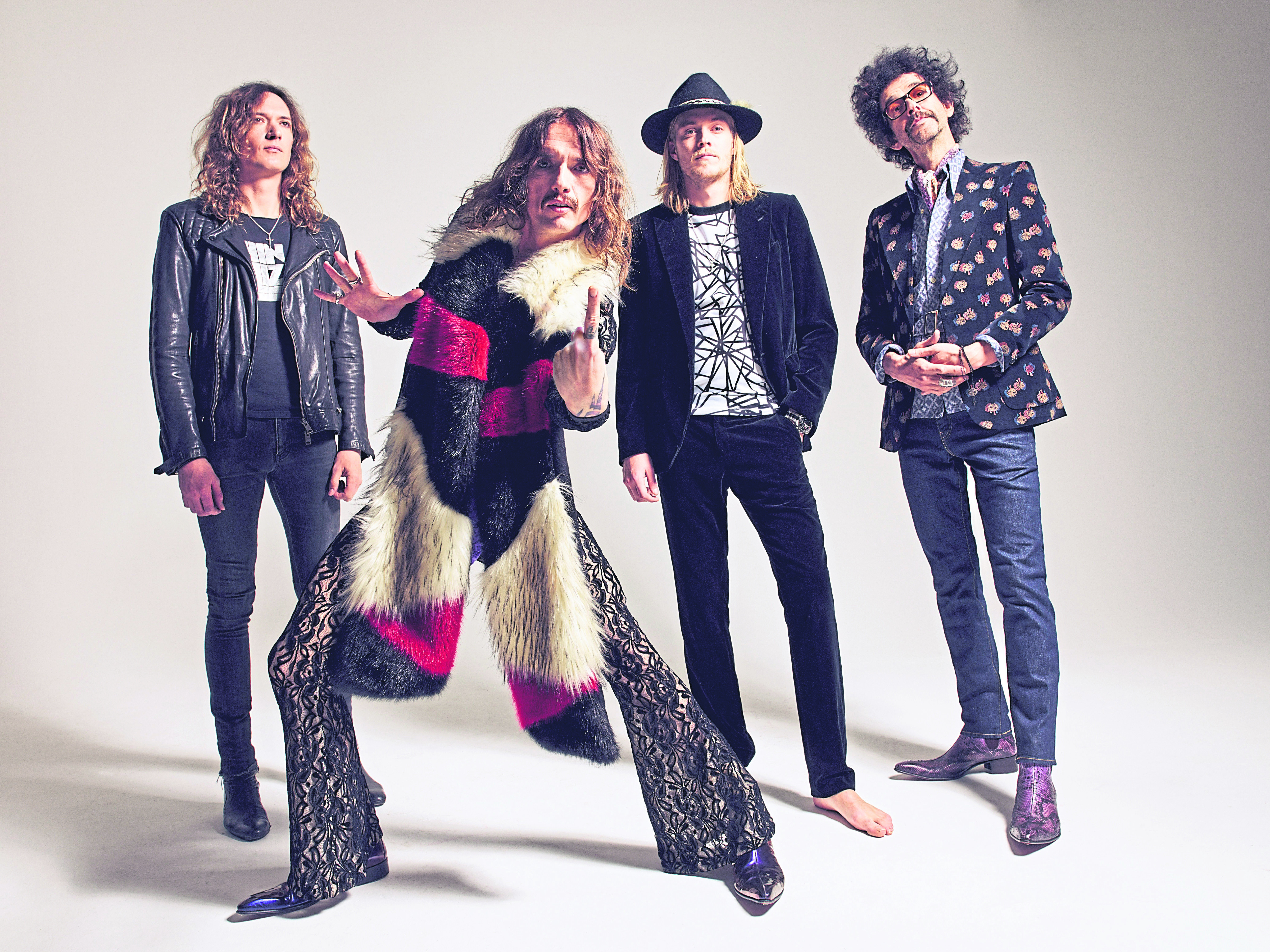The Darkness, from left, Dan and Justin Hawkins, Rufus Taylor and Frankie Poullain