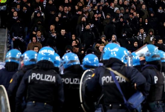 Police in riot gear stand guard during Lazio’s defeat to Eintracht Frankfurt last season at Stadio Olimpico, which Celtic visit on Thursday night