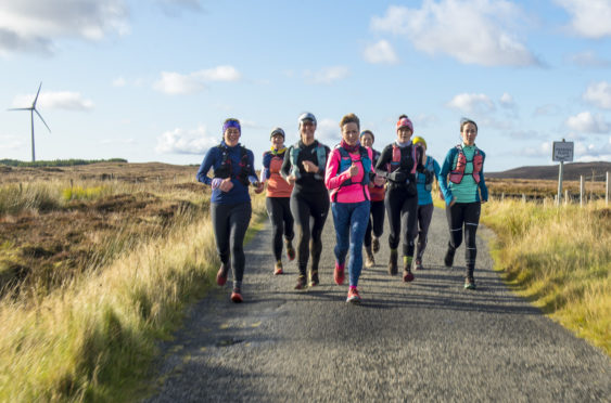 Kirsty Aplin, Allie Bailey, Lorna Spayne, 
Anna Brown, Laura Fisher, Gillian McColl, 
Kim Hopkinson, Amanda Butler and Alice Kirk ran through moors, on road, at night and on beaches during their record-breaking adventure