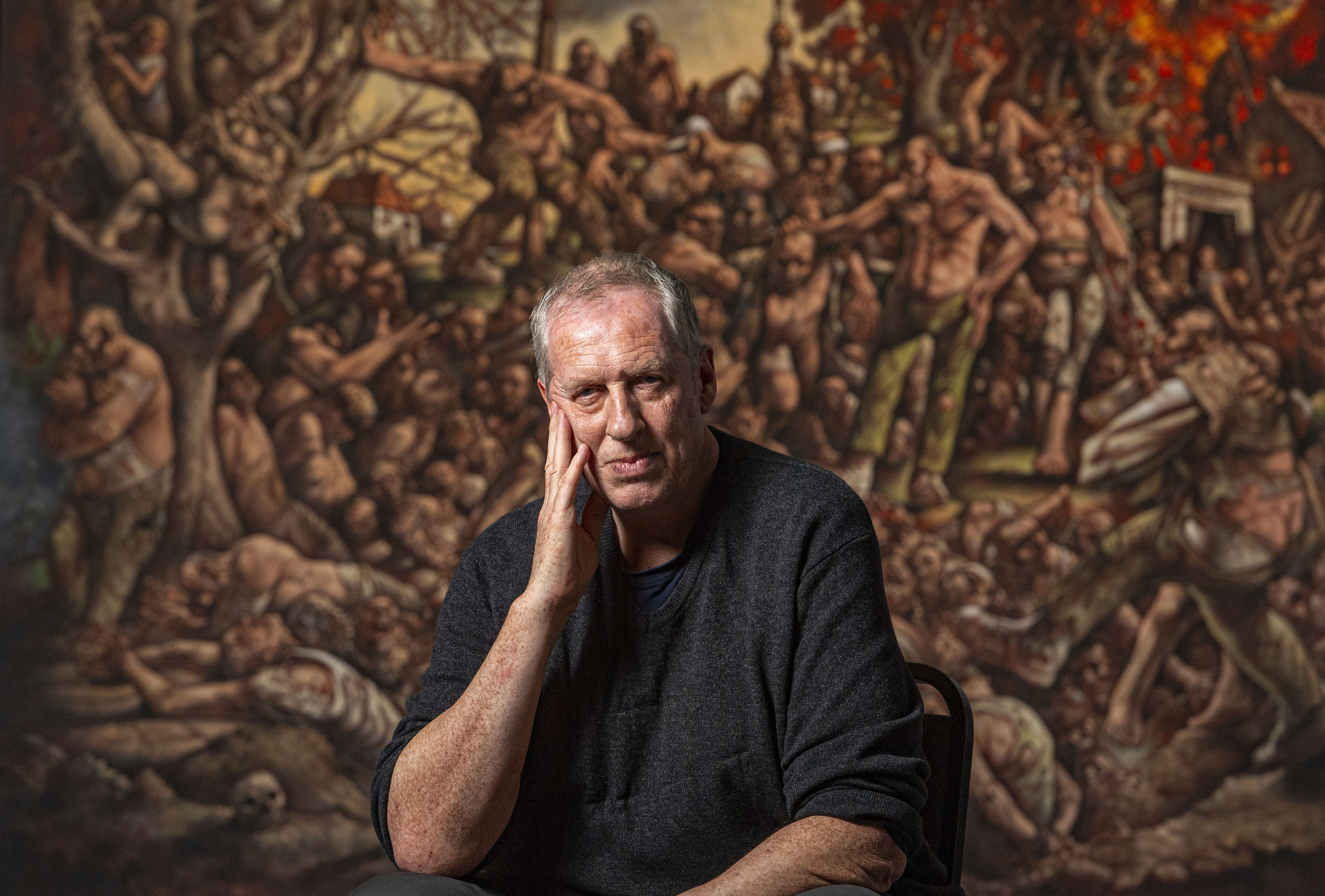 Artist Peter Howson unveils a new painting at St Mungo Museum, Glasgow to commemorate the 25th Anniversary of the Srebrenica Masscare