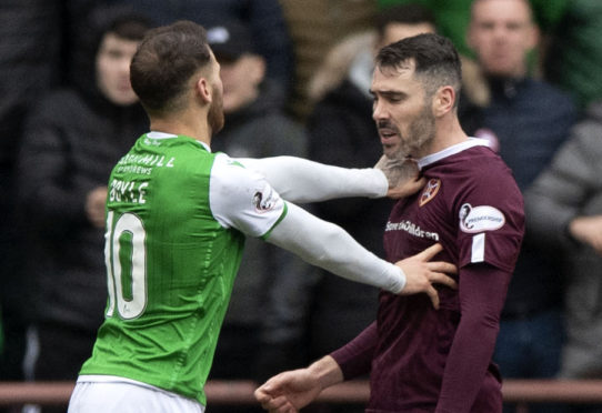 Little festive cheer between Michael Smith and Martin Boyle on Boxing Day