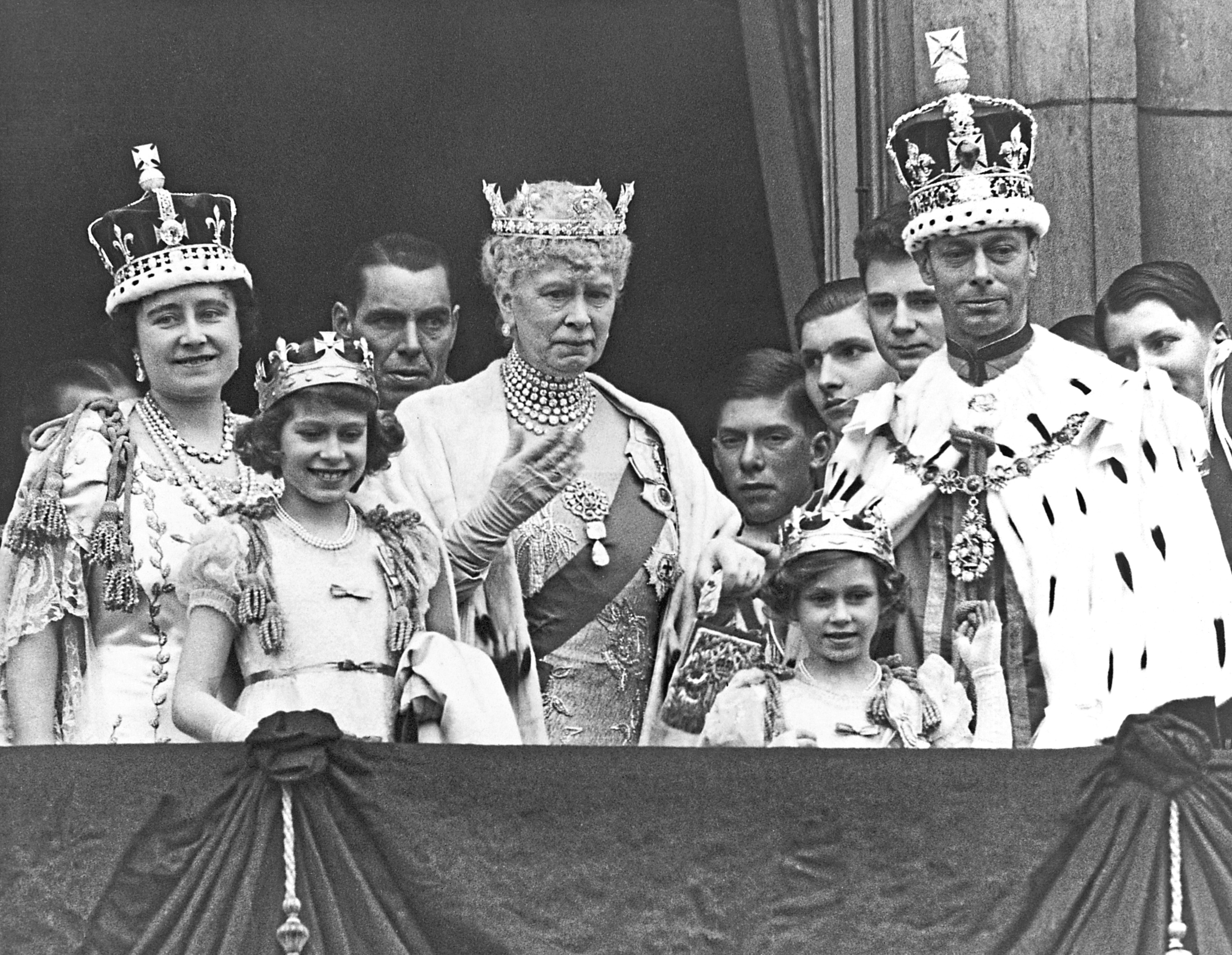 The Royal Family on the balcony at Buckingham Palace after the coronation of King George VI of England. Shown are (from left to right): Queen Elizabeth; Princess Elizabeth; Queen Mary the Queen Mother; Princess Margaret; and King George VI.
