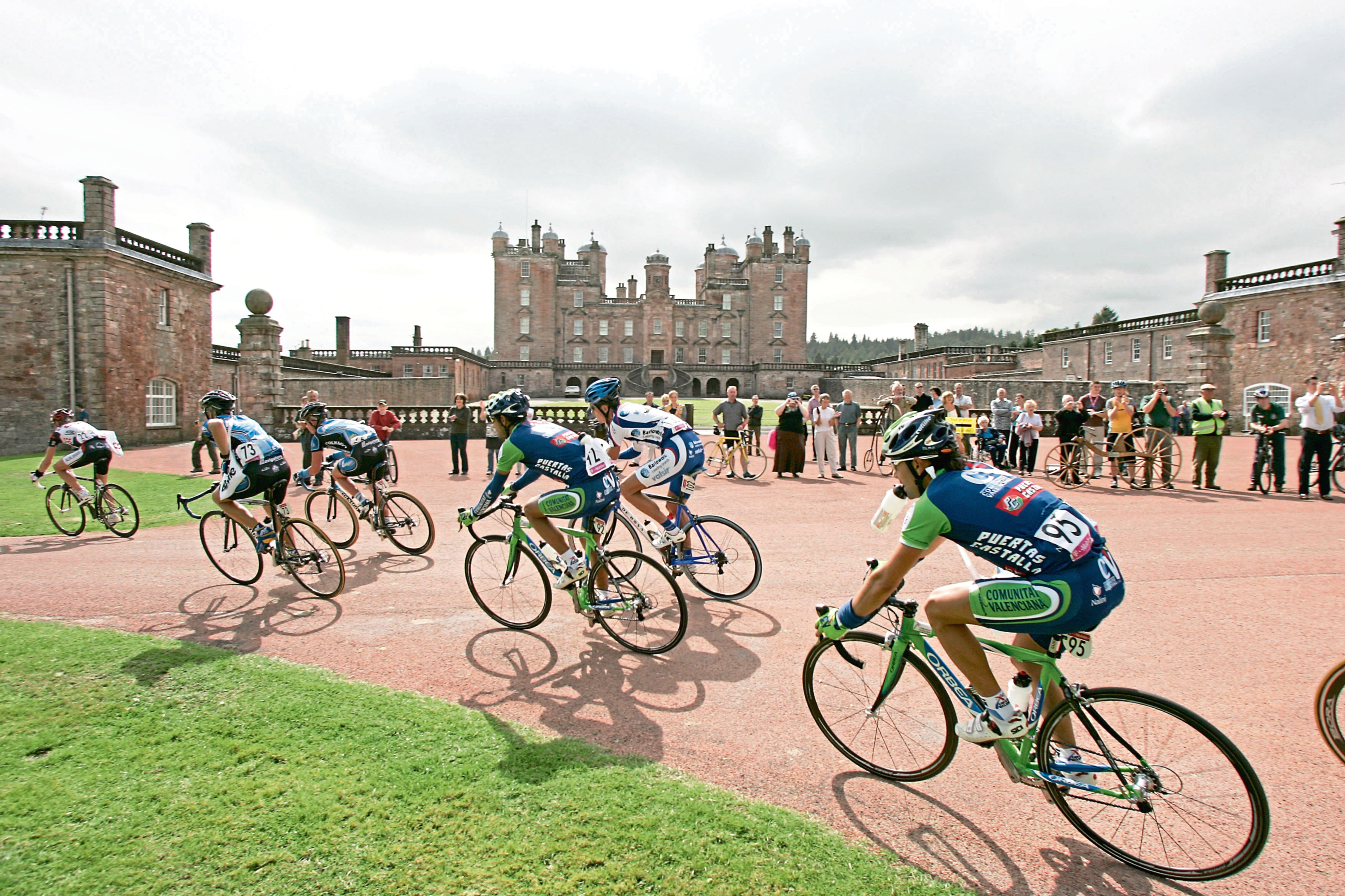 The 2005 Tour of Britain. Stage 1: Glasgow to Castle Douglas (114.5 miles). The leaders pass Drumlanrig Castle Thornhill.