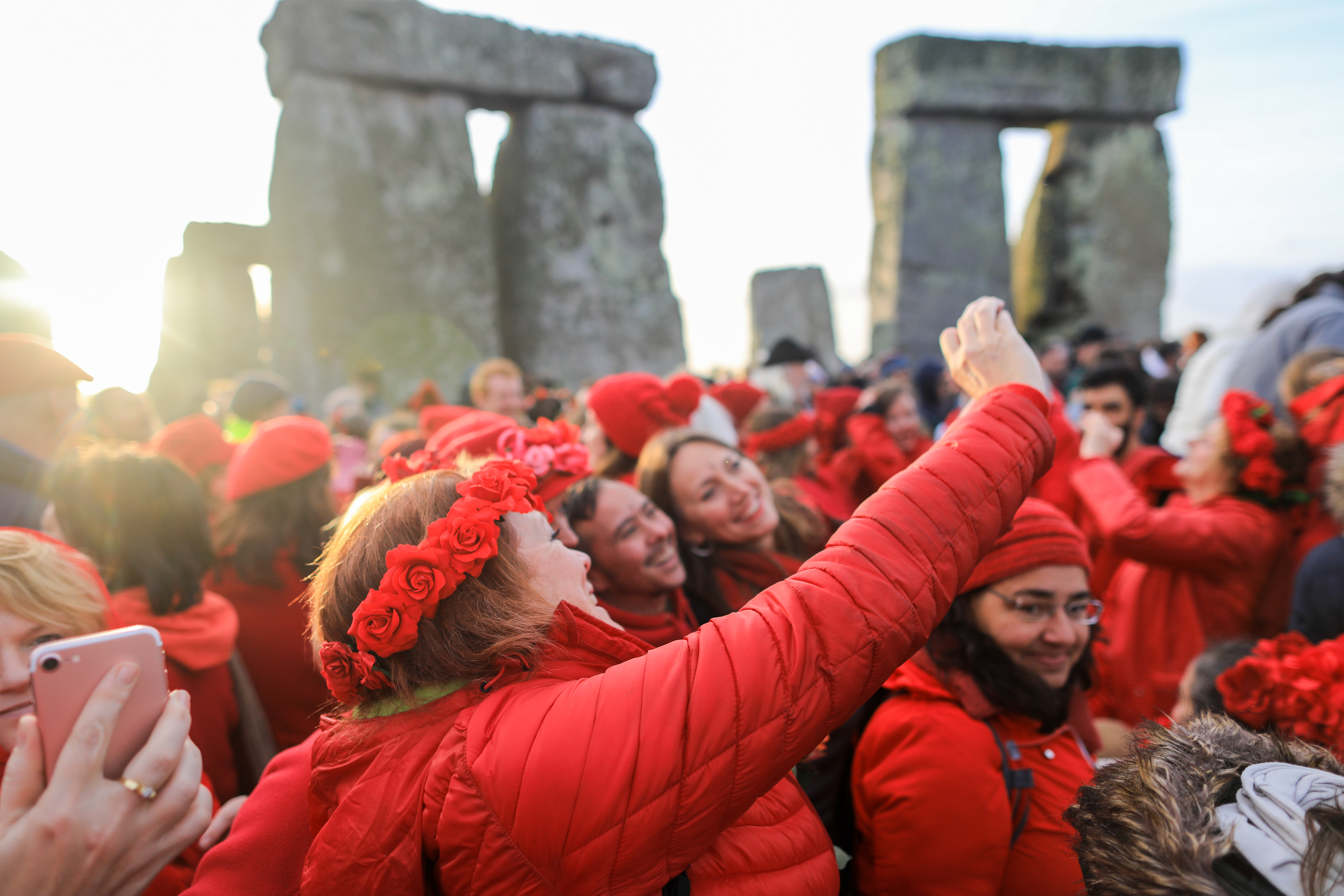People taking selfies at Stonehenge