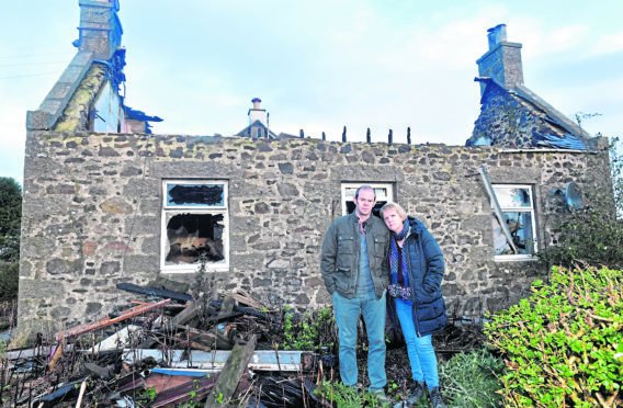 Full time NHS paramedic Donald and F.T NHS acute nurse Angela MacGillivray's country house burned down 18 months ago. They are insured but their insurers have so far failed to pay out .