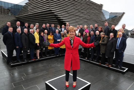 First Minister and SNP leader Nicola Sturgeon at the V&A Museum, in Dundee, where she joined her party’s newly elected MPs yesterday