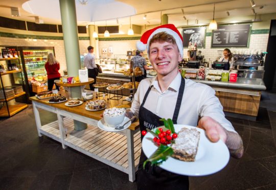 Waite, Morgan McKnight serving mince pie slice