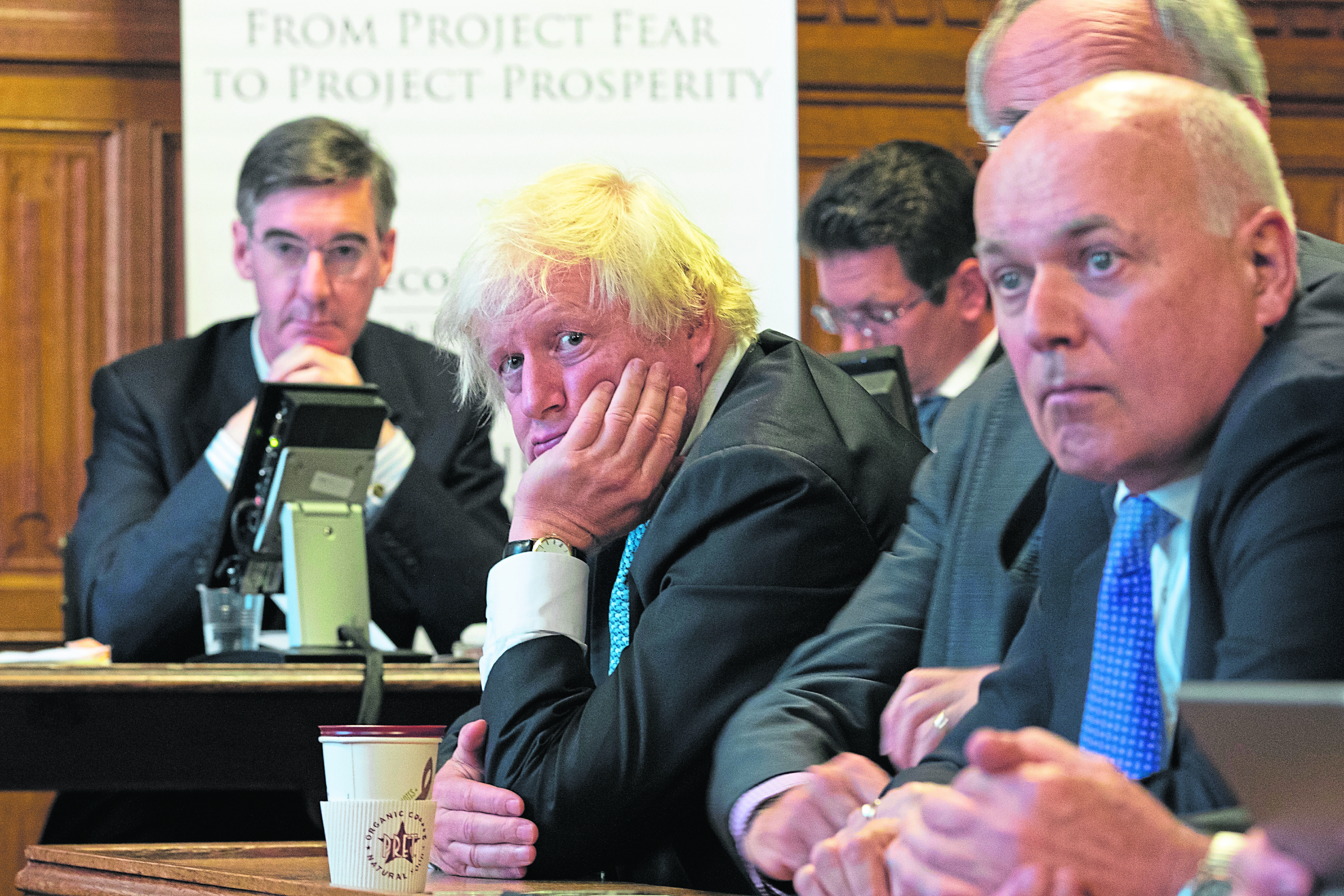 Iain Duncan Smith (right) with Jacob Rees Mogg (left) and Prime Minister Boris Johnson