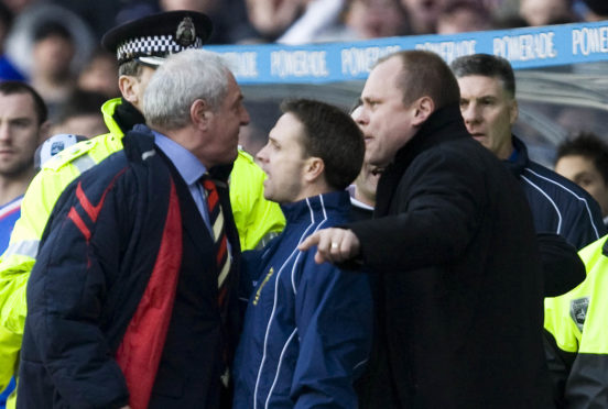 March 2008, and Crawford Allan has to separate Walter Smith and Mixu Paatelainen during a Scottish Cup tie at Ibrox