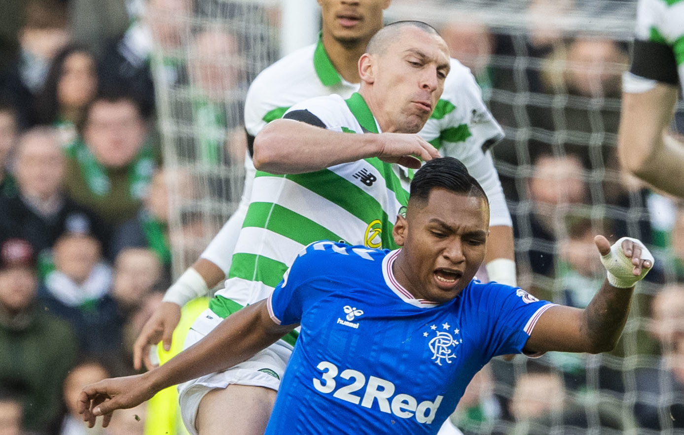 Celtic's Scott Brown tackles Rangers' Alfredo Morelos