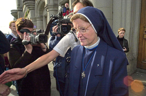 Sister Alphonso leaves Aberdeen Sheriff Court after her conviction in 2000