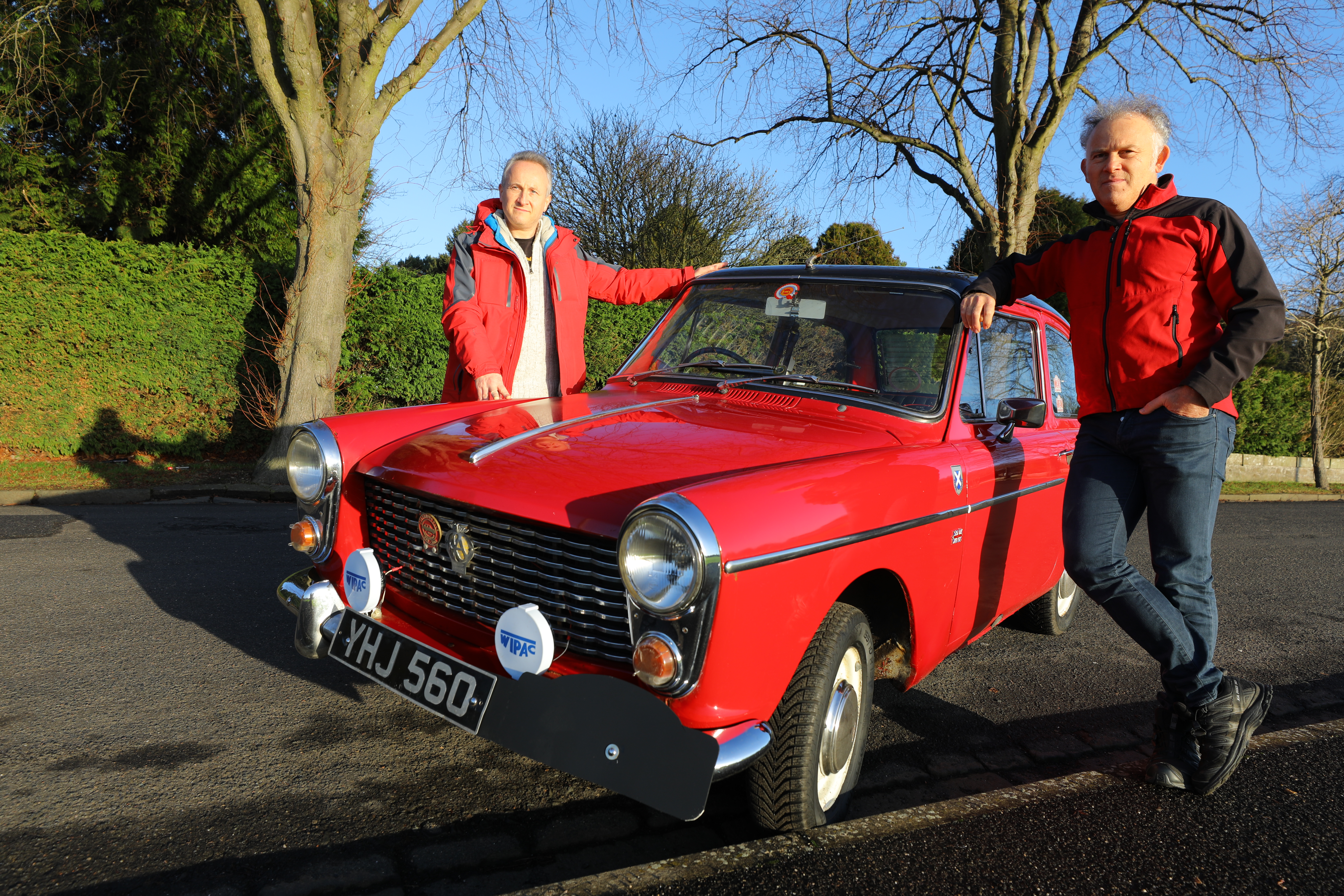 Brothers Colin, left, and Richard Levin beside their Austin A40