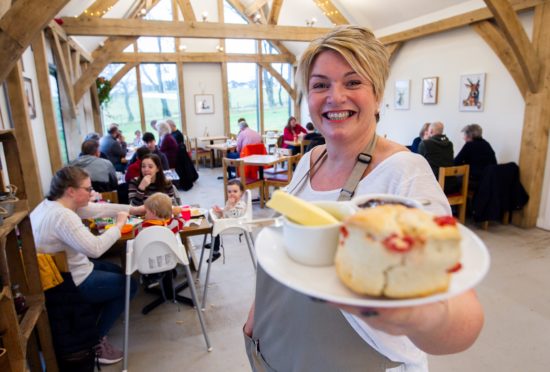 The fruit scone at The Heron Farm Shop & Kitchen is large, light and sweet with a decent amount of juicy fruit inside