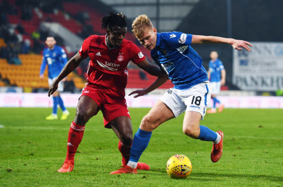 Ali McCann (right) in action against Aberdeen