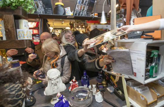 Shoppers snap up top brands at the launch of the designer sale at Shelter Scotland’s shop in Stockbridge, Edinburgh, on Friday