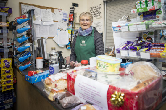 Volunteer Jenny Morrison helps out in Straiton's community shop