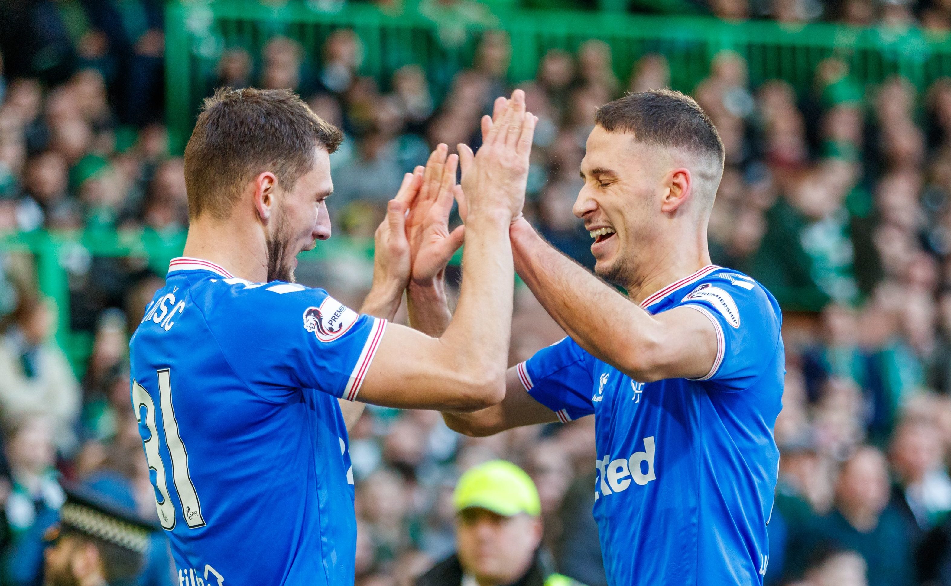 Nikola Katic (right) celebrates his goal against Celtic with countryman Borna Barisic