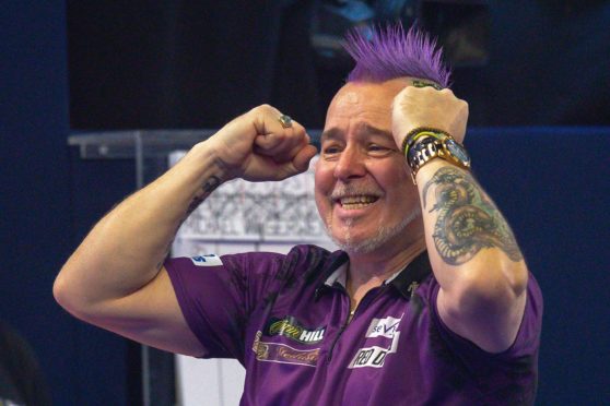 Peter Wright celebrates his win