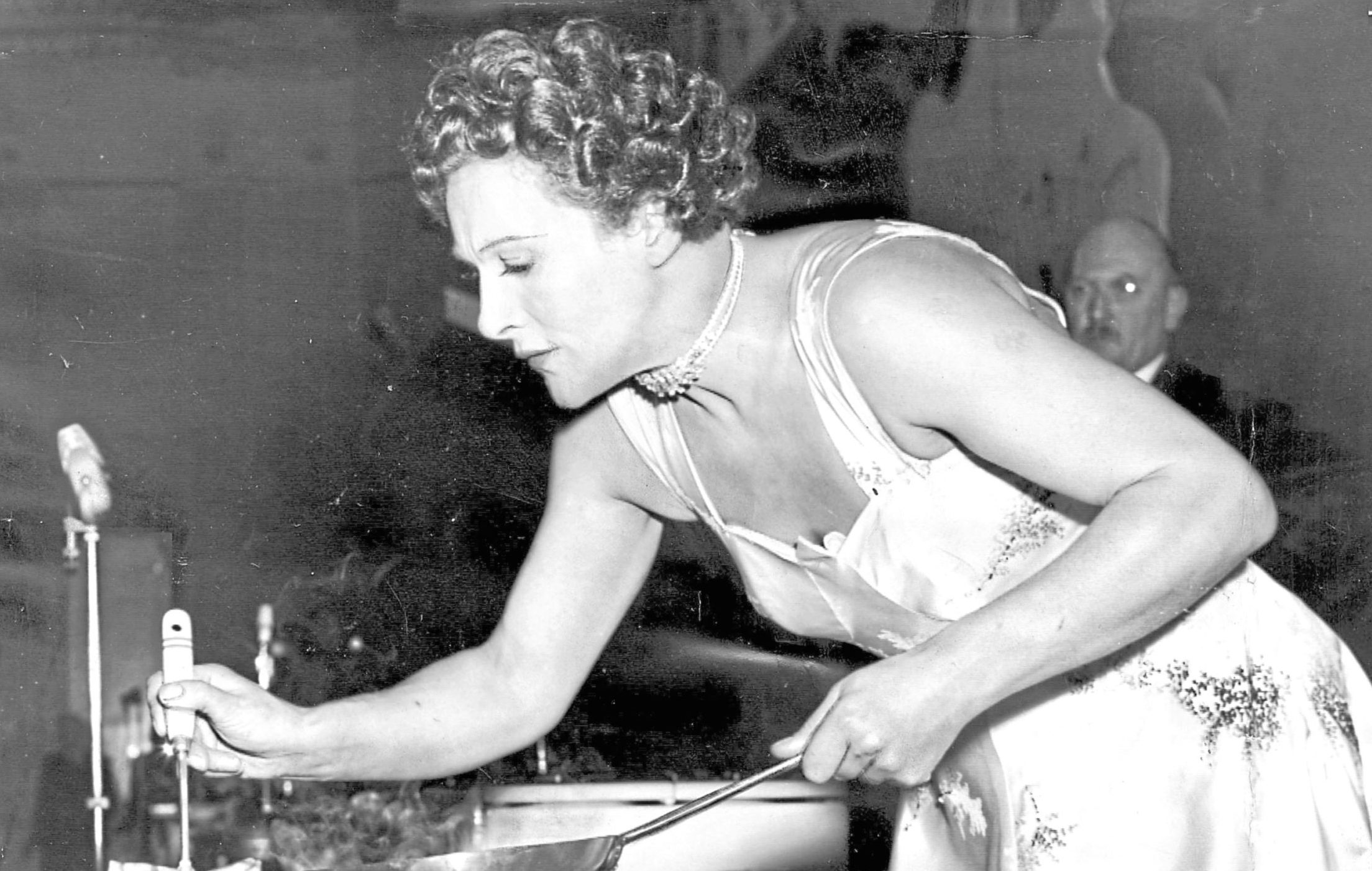 Fanny cooking in satin at the Cafe Royal in 1956
