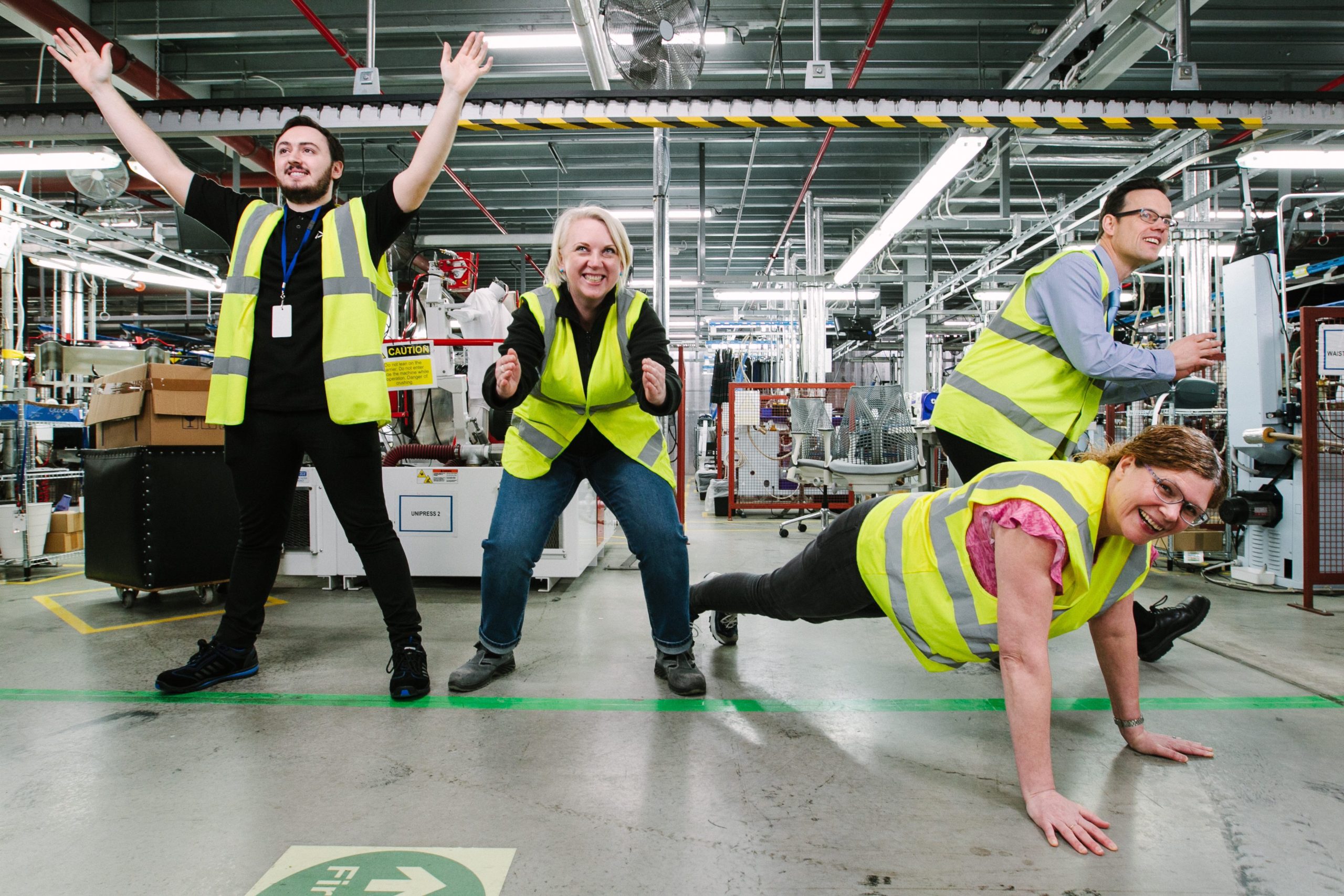 Connor Keane, Izabela Kirszke, Jan Buntin and Andrew MacFarlane of ACS Clothing work out in the company’s factory at Eurocentral near Motherwell