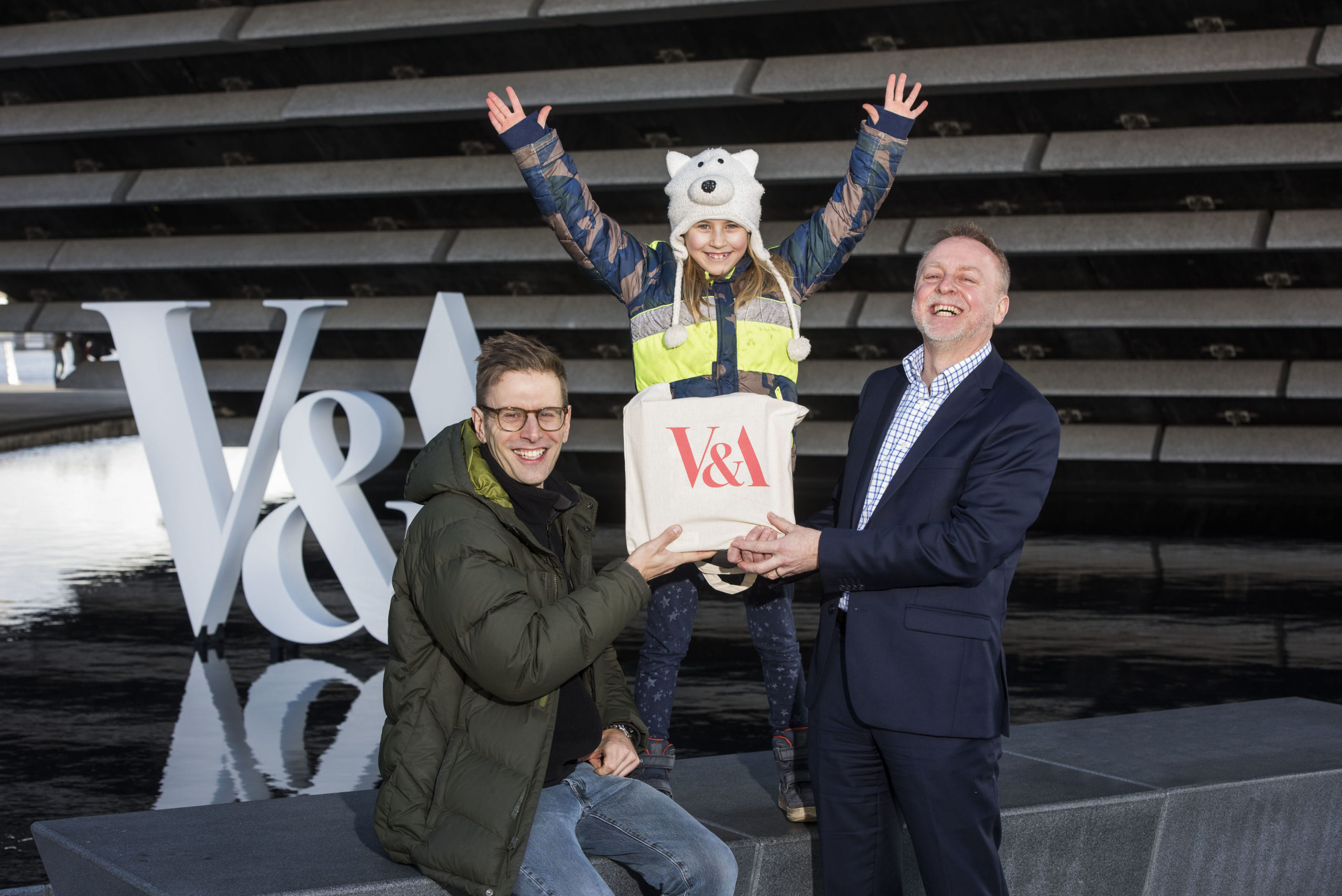 Philip Long, director of V&A Dundee (right), with Jan Becker and his daughter Nalani Becker, seven, from Berlin