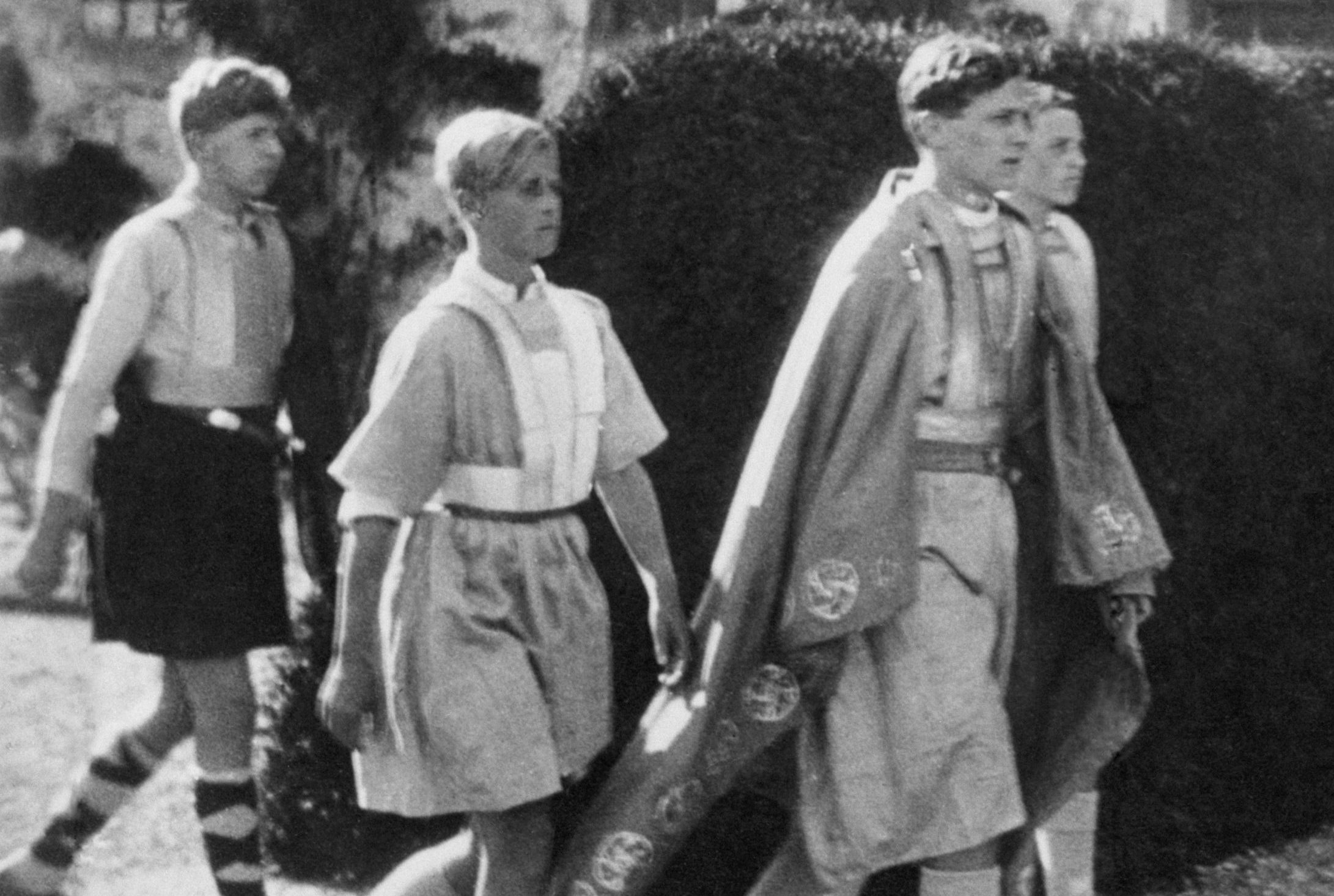 12-year-old Prince Philip, second left, 
takes part in a pageant at Gordonstoun School in Moray in 1933