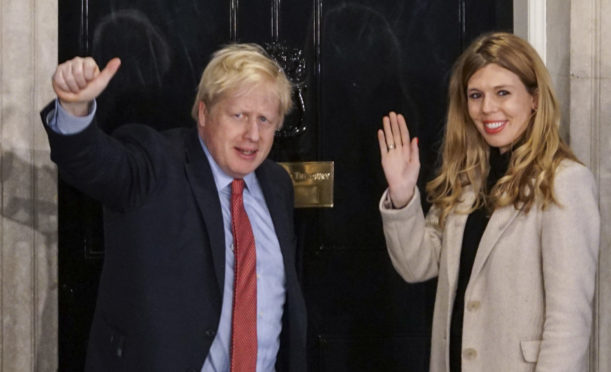 Prime Minister Boris Johnson and his girlfriend Carrie Symonds outside No 10 Downing Street