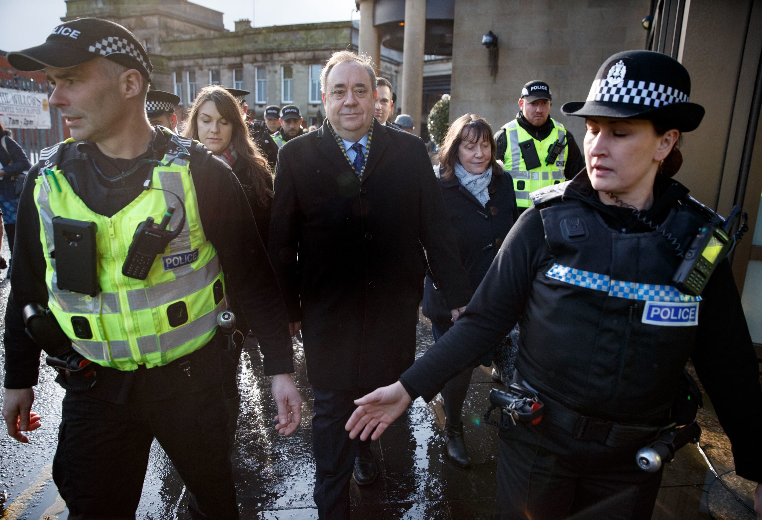 Former First Minister Alex Salmond arrives at the High Court in Edinburgh with a police escort as the trial over attempted rape and sexual assault charges begins. He denies all the charges