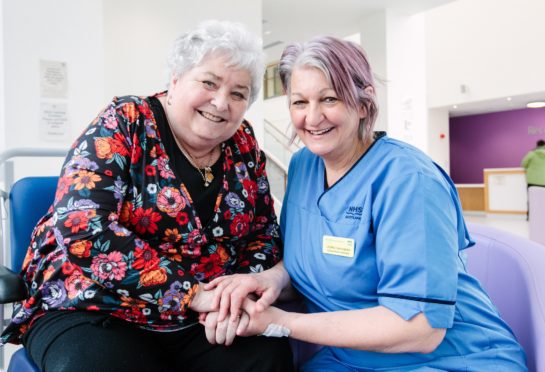 Joan Martin, 74, with nurse Laura Cunningham at Queen Elizabeth University Hospital in Glasgow