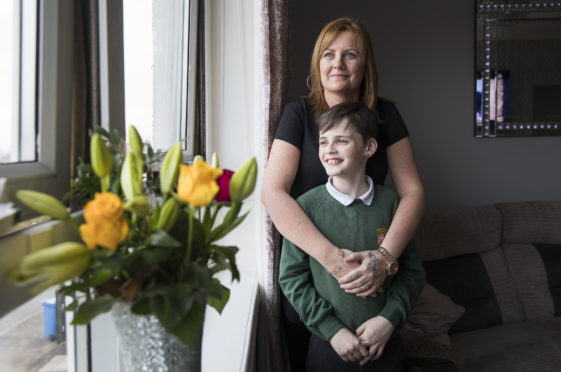 Sharon Muirhead with son Spencer, now aged 10, at home in Saltcoats, Ayrshire last week