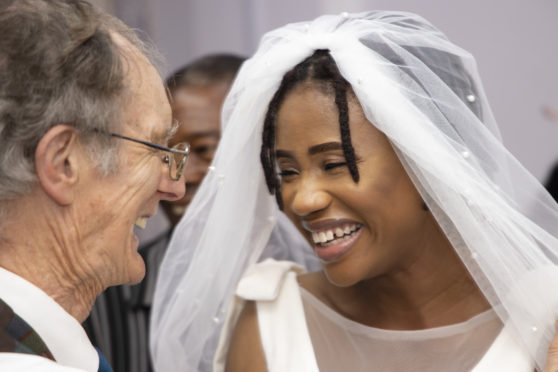 Regina Conteh shares the joy of her wedding day in Sierra Leone last month with Keith Thomson, the doctor who saved her life