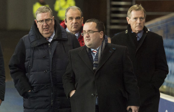 Douglas Park (left) at Ibrox with Dave King and his son, Graeme, who remains on the Ibrox Board