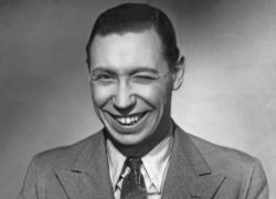 Formby in classic pose