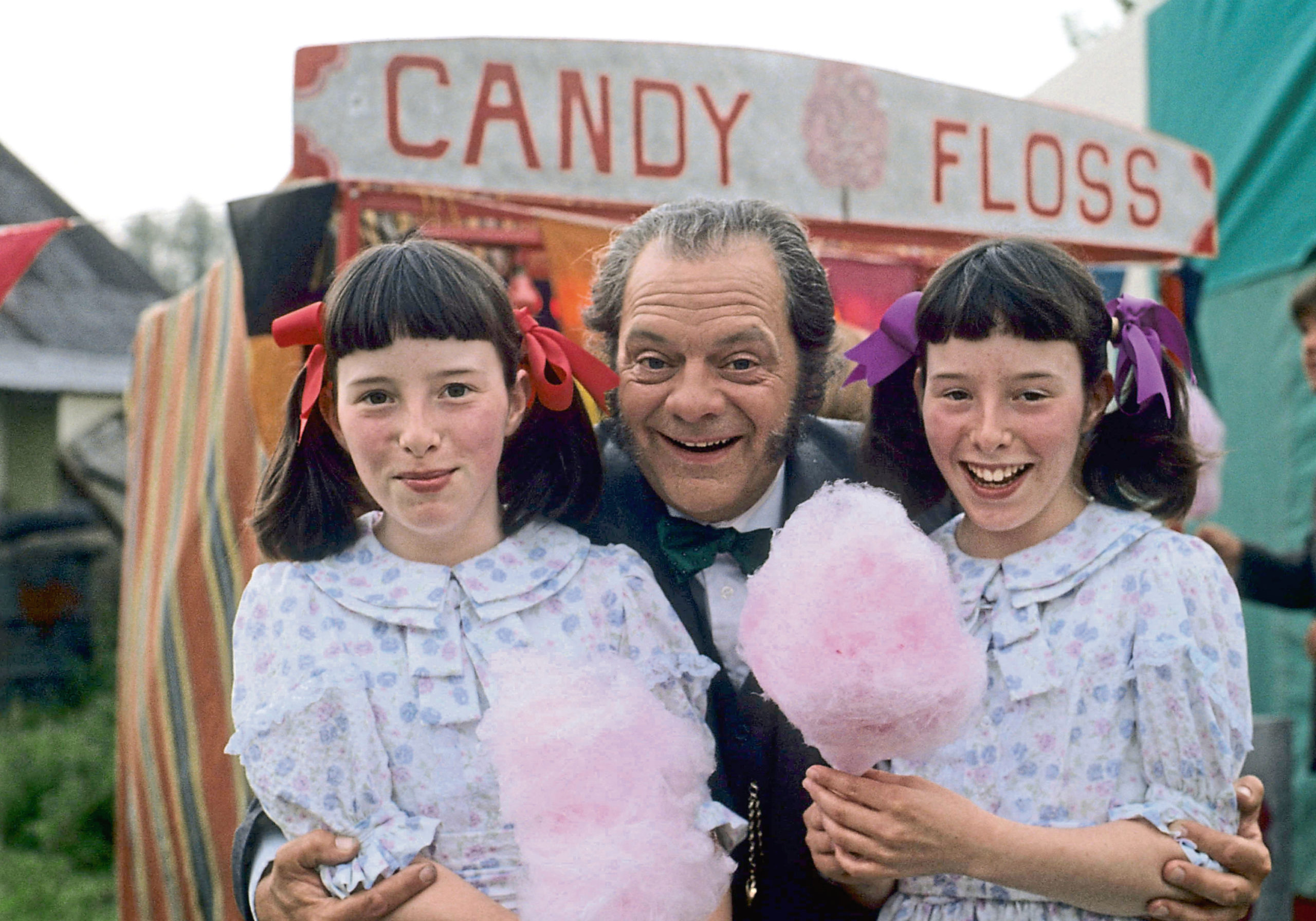 Chrissie (left) and Kitty with David Jason as their on-screen dad Pop Larkin in 1991