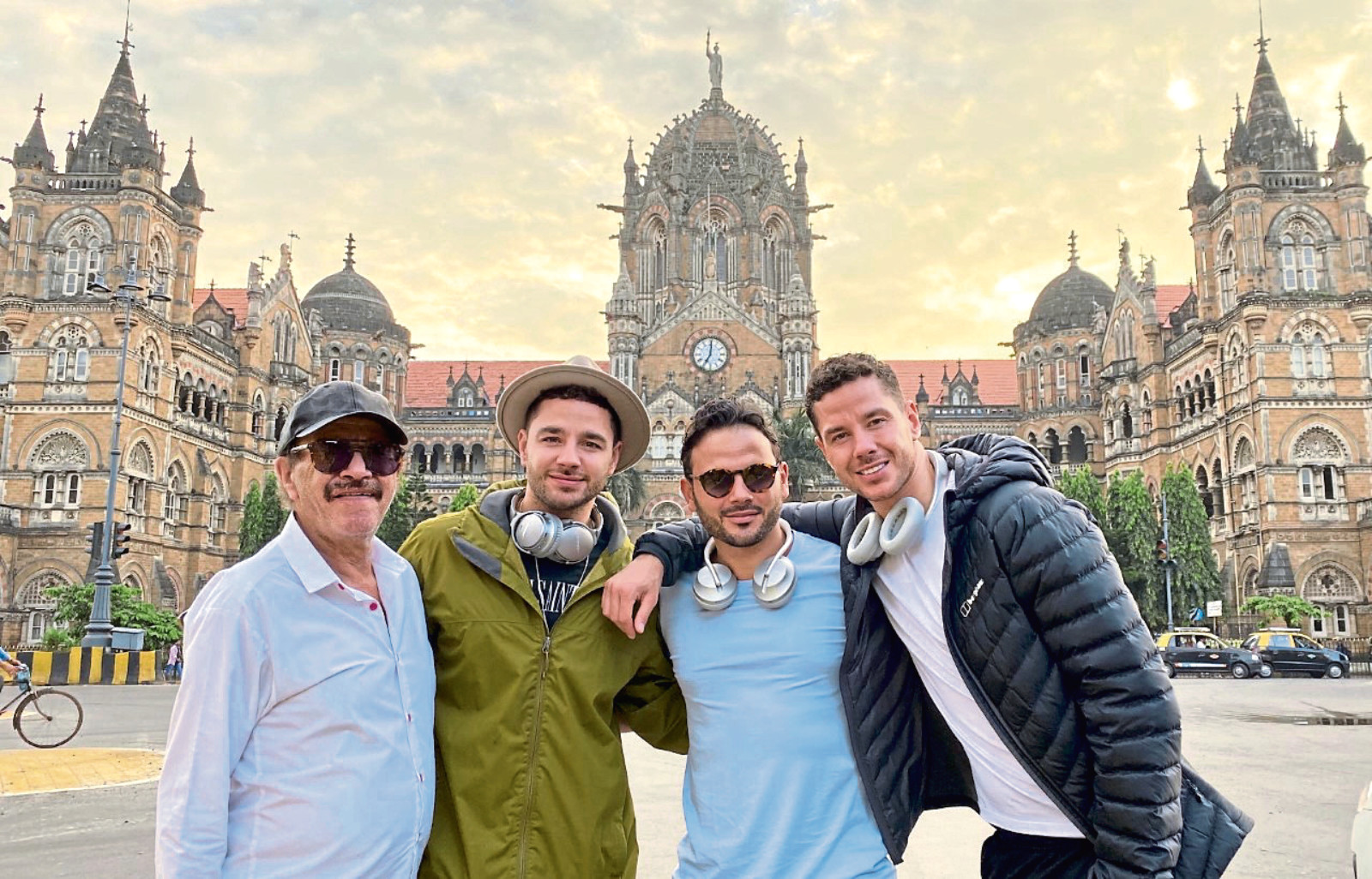 Dad Dougie with Adam, Ryan and Scott Thomas at Mumbai Station