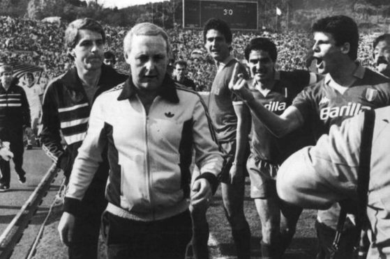 Walter Smith and Jim McLean run the gauntlet from Roma players