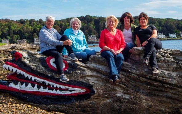 (Left to right) Bronwyn Jenkins-Deas, Juli Dempsey, Lynda Gill, Philippa Dalton and Jenine Ward on Cumbrae's famous Crocodile Rock