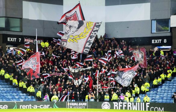 Fans are pictured ahead of the UEFA Europa League last 16 first leg between Rangers and Bayer Leverkusen at Ibrox