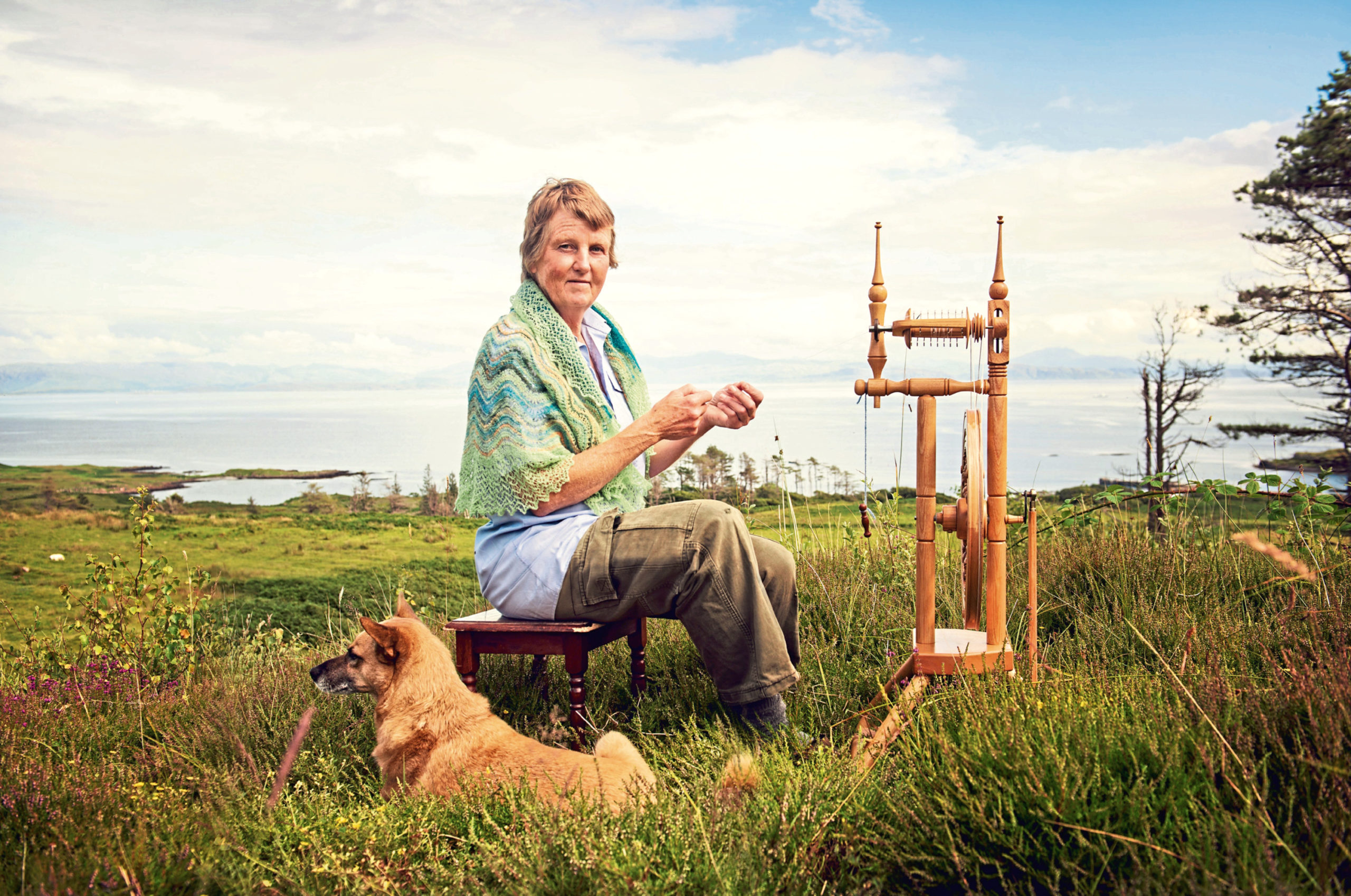 Jenny Robertson embraces Eigg’s peace and quiet with spinning wheel and pet dog