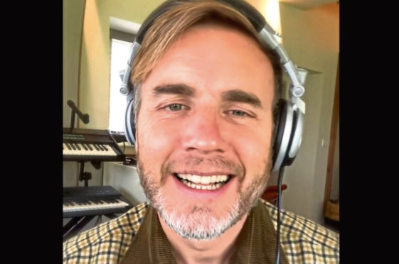 Gary Barlow is letting it all grow out