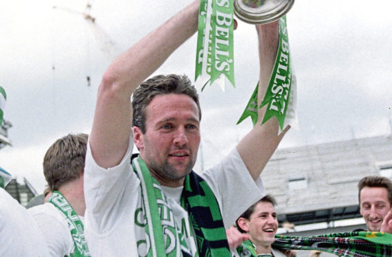 Celtic's Paul Lambert lifting the league title in 1998