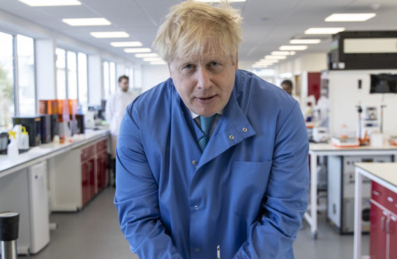 Boris Johnson visits Mologic lab in Bedfordshire to announce £46m funding for testing kits on March 6 before, five days later, suspending the UK programme of testing and contact tracing