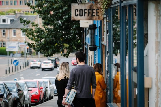 A queue for coffee in Battlefield, in Glasgow’s southside, on Thursday