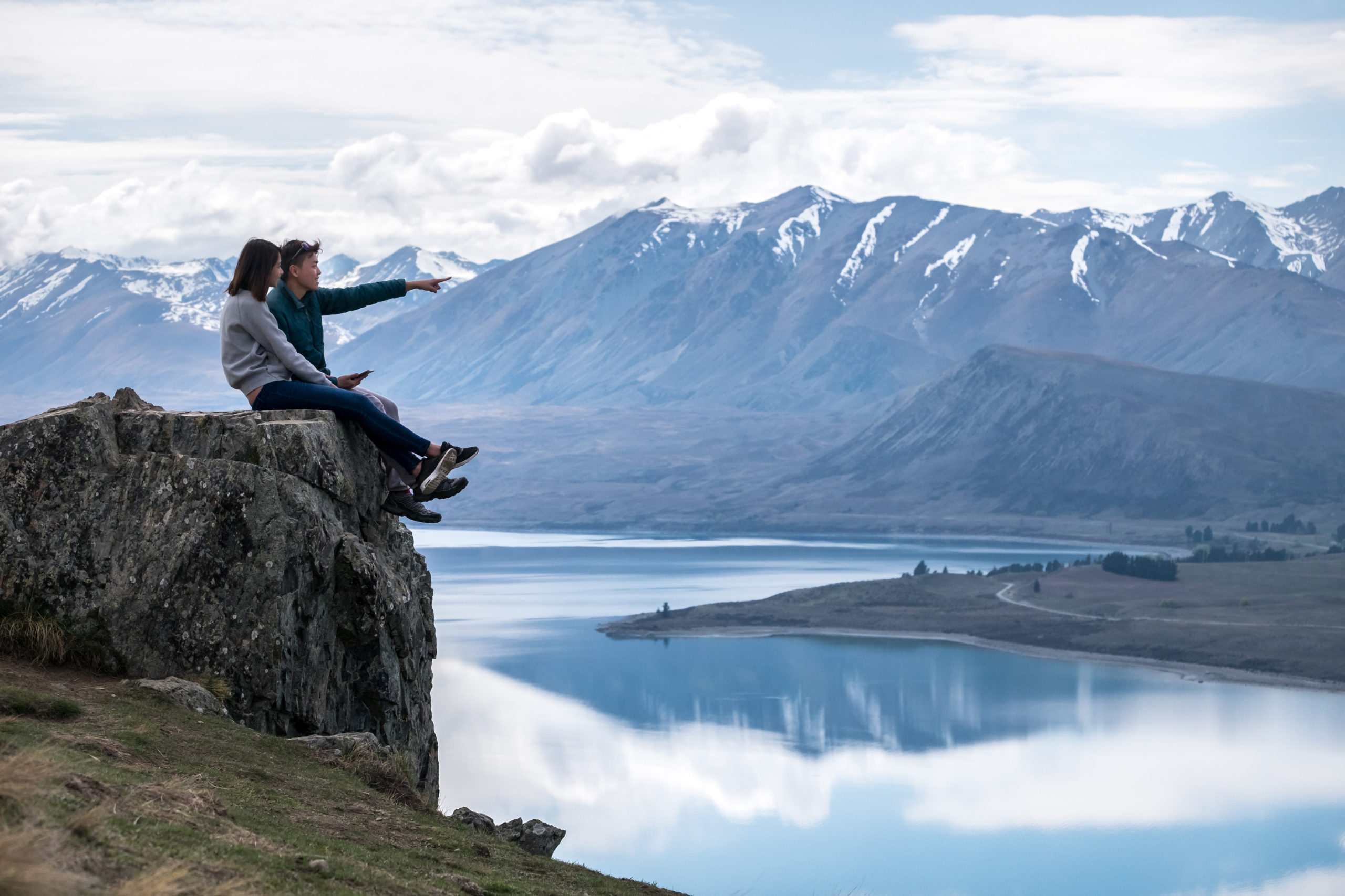 The dream: The holidaymakers anticipate spectacular scenery and wild vistas in New Zealand